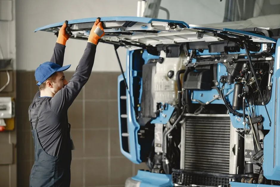 Illustrative photo of a driver performing a pre-trip vehicle inspection